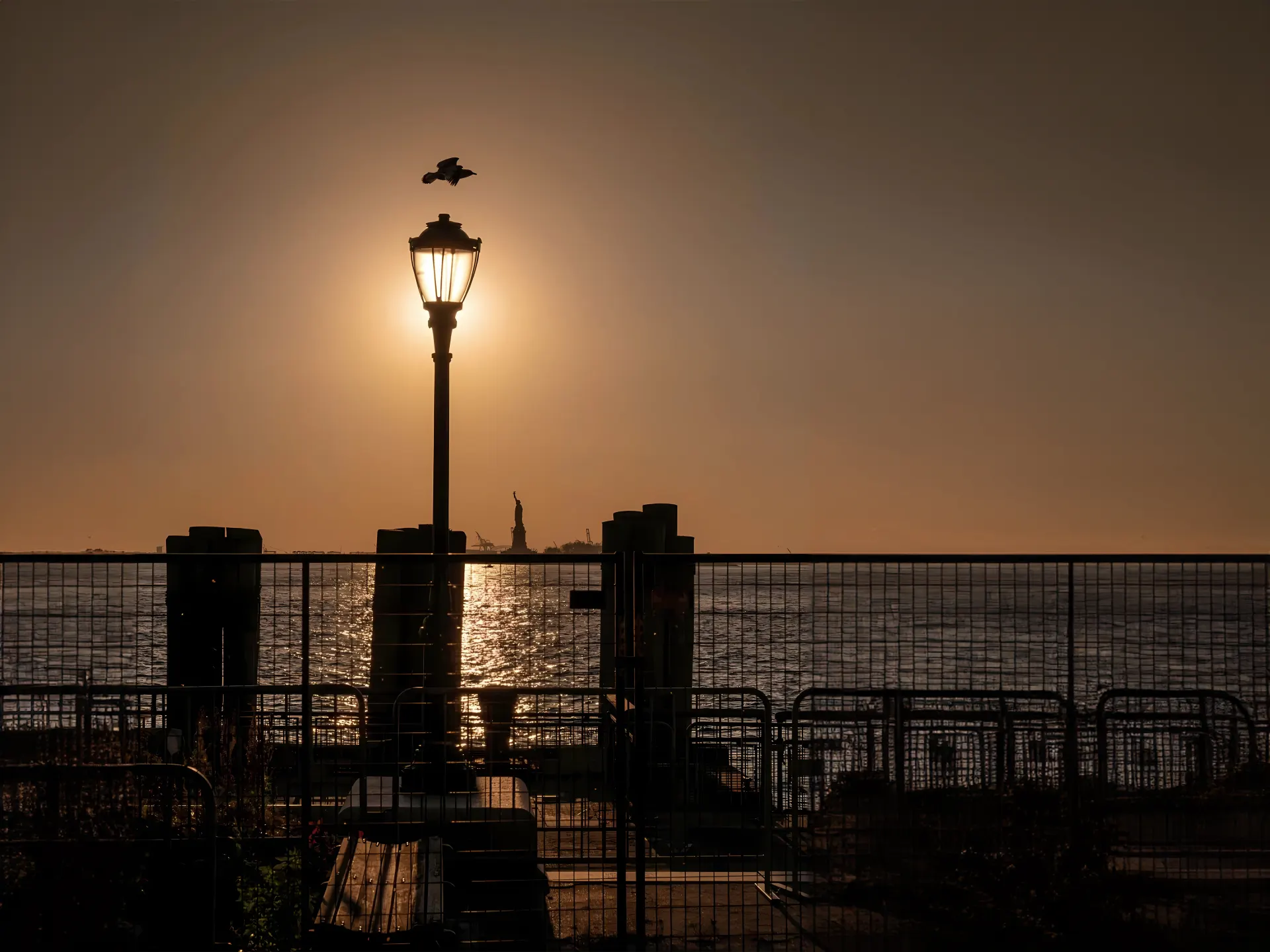 Statue of Liberty Sunset Waterfront Wallpaper