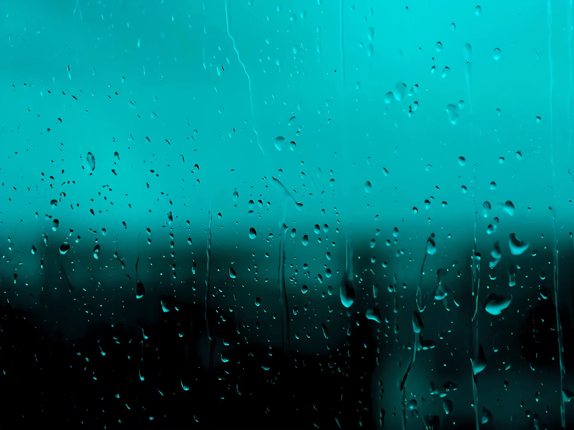 Turquoise Raindrops on Window Wallpaper