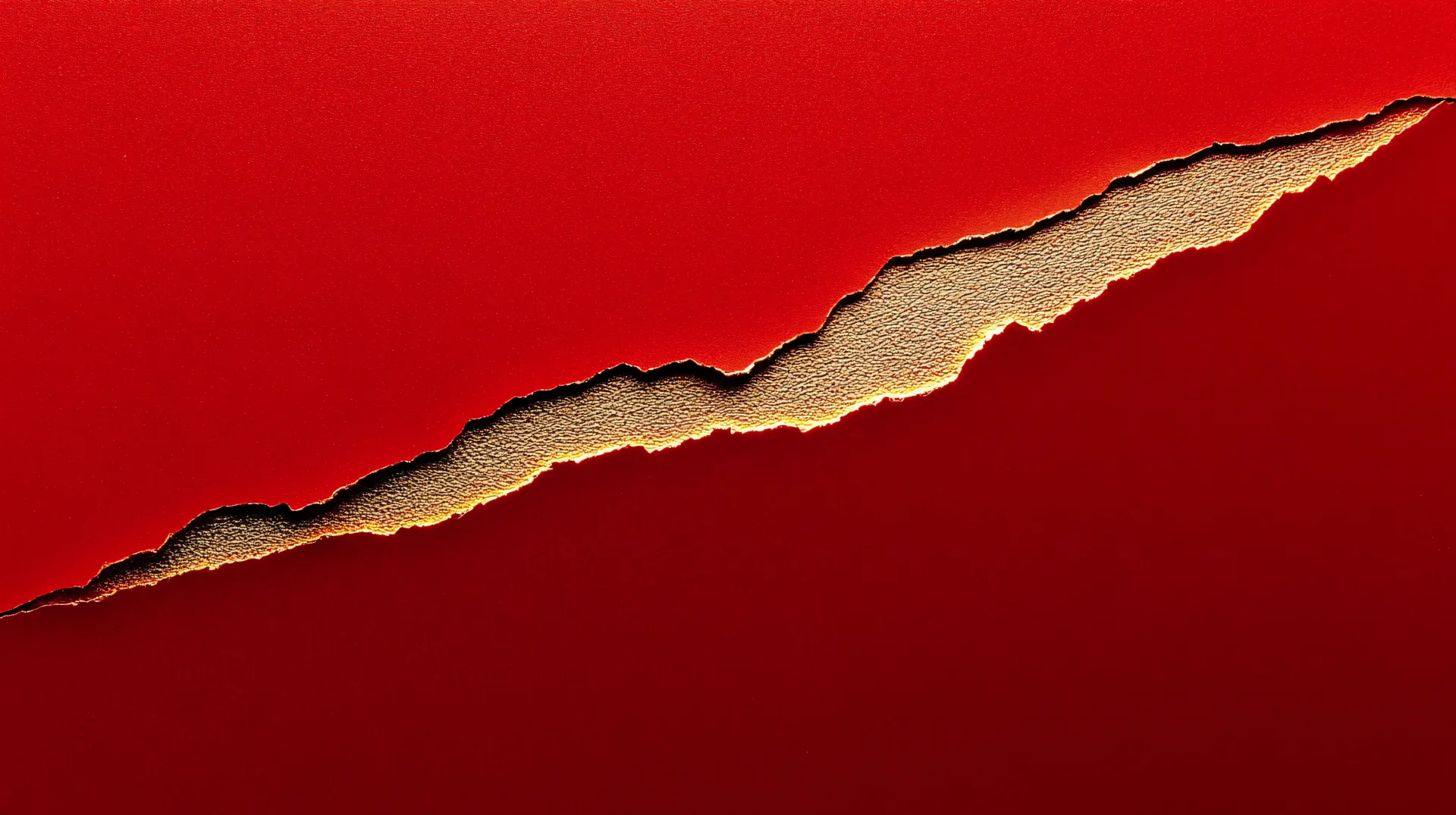 Torn Red Paper with Glowing Gold Edge Wallpaper