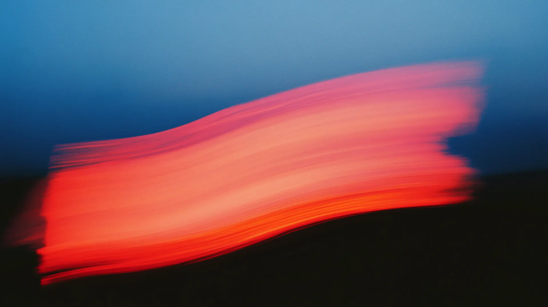 Glowing Red and Pink Light Streak Abstract Wallpaper