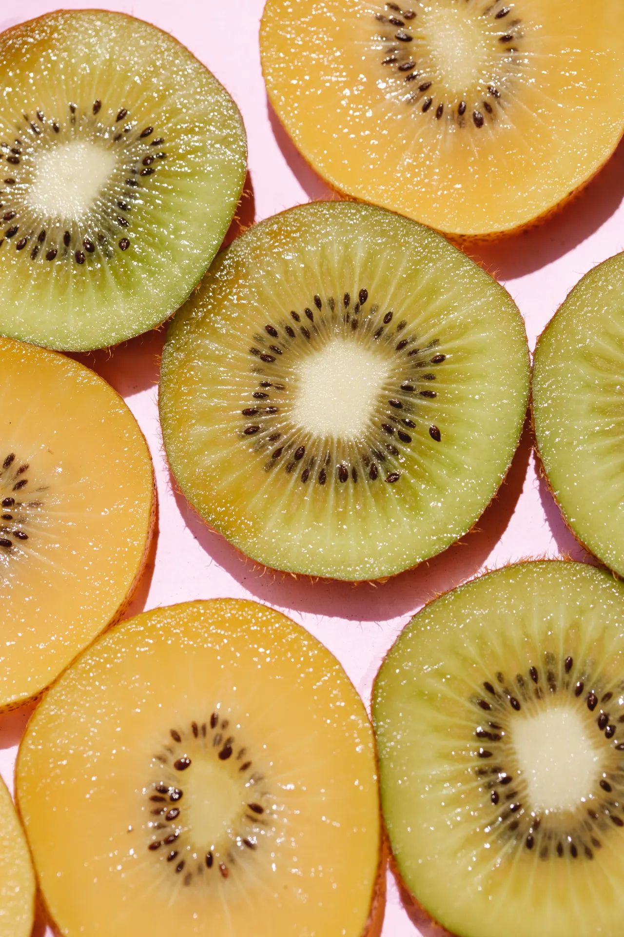 Colorful Green and Golden Kiwi Fruit Wallpaper