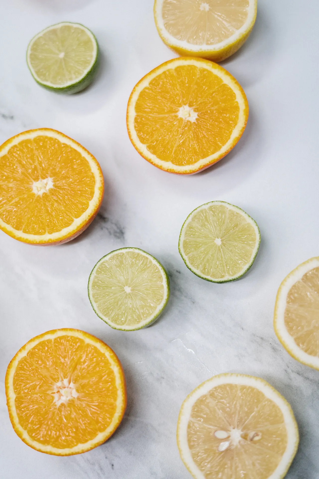 Fresh Orange Lemon and Lime Slices Wallpaper