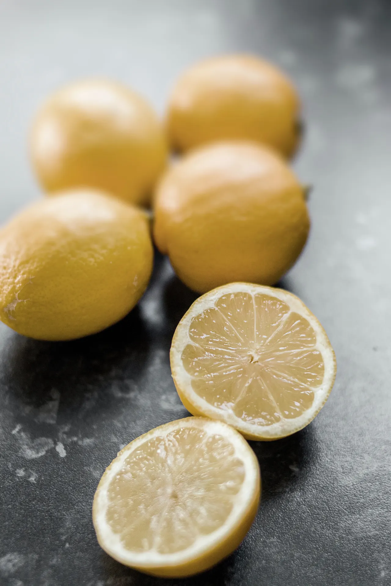 Fresh Whole and Sliced Lemons Wallpaper