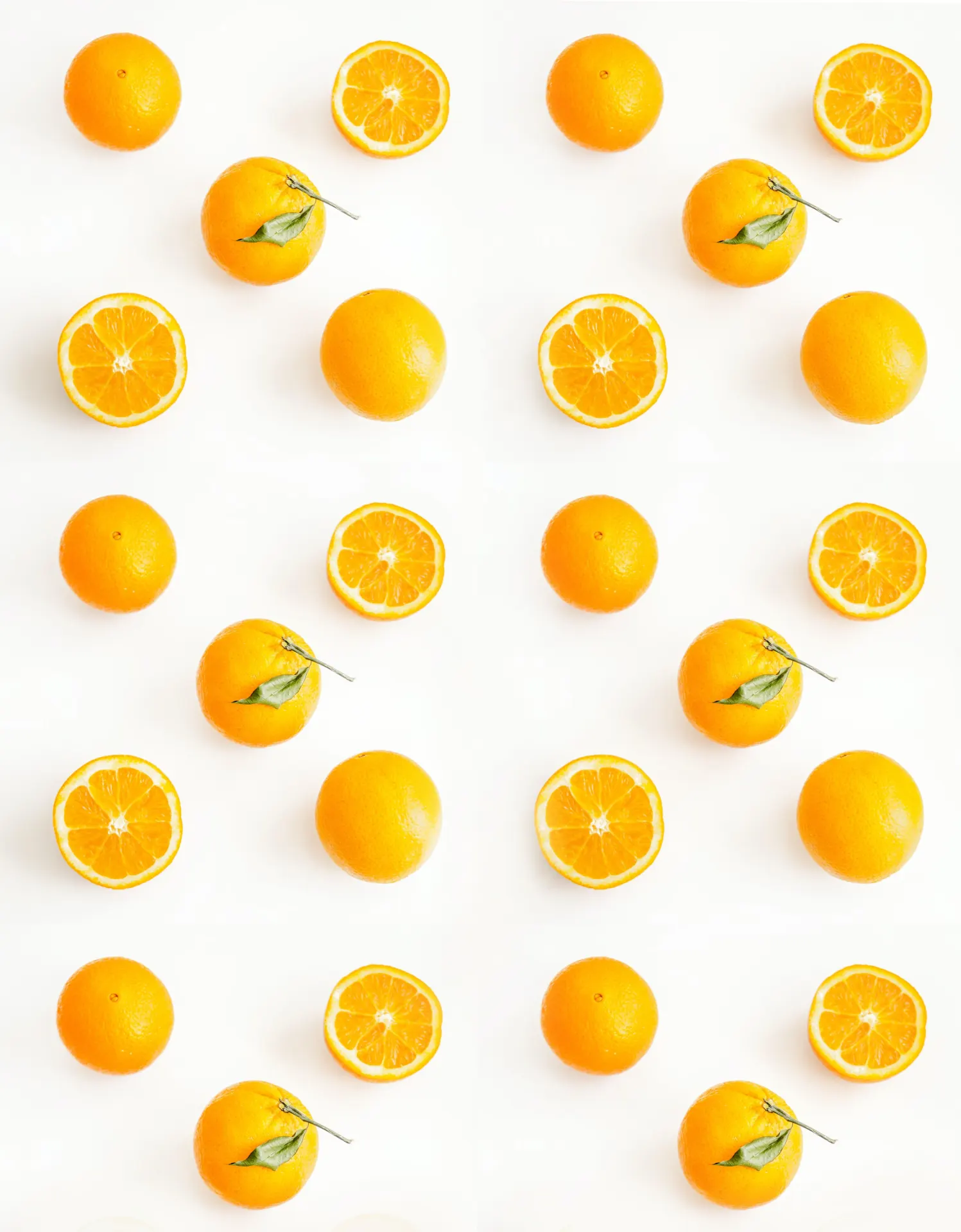 Fresh Whole and Sliced Oranges Wallpaper