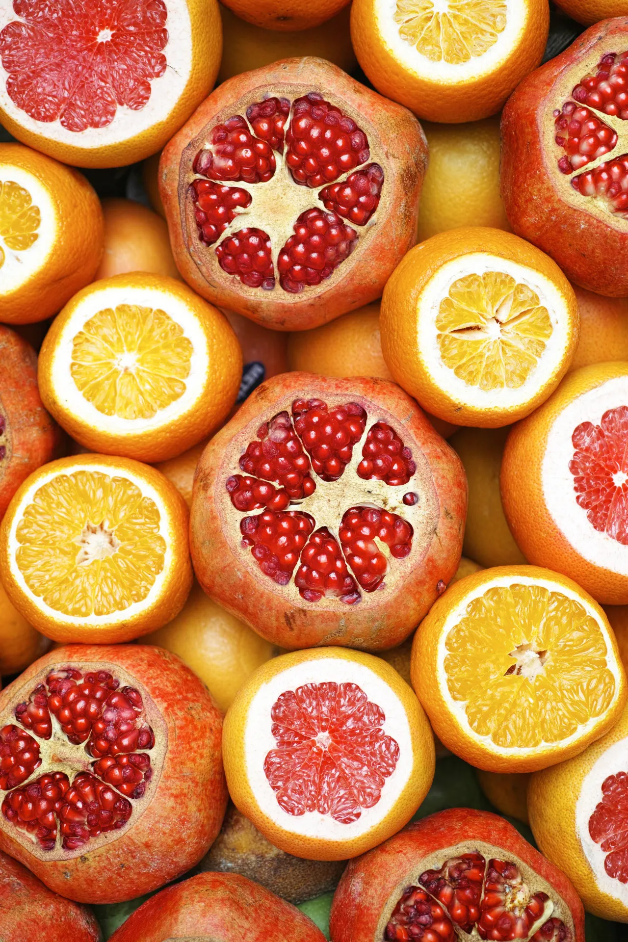 Colorful Pomegranate and Citrus Fruit Wallpaper
