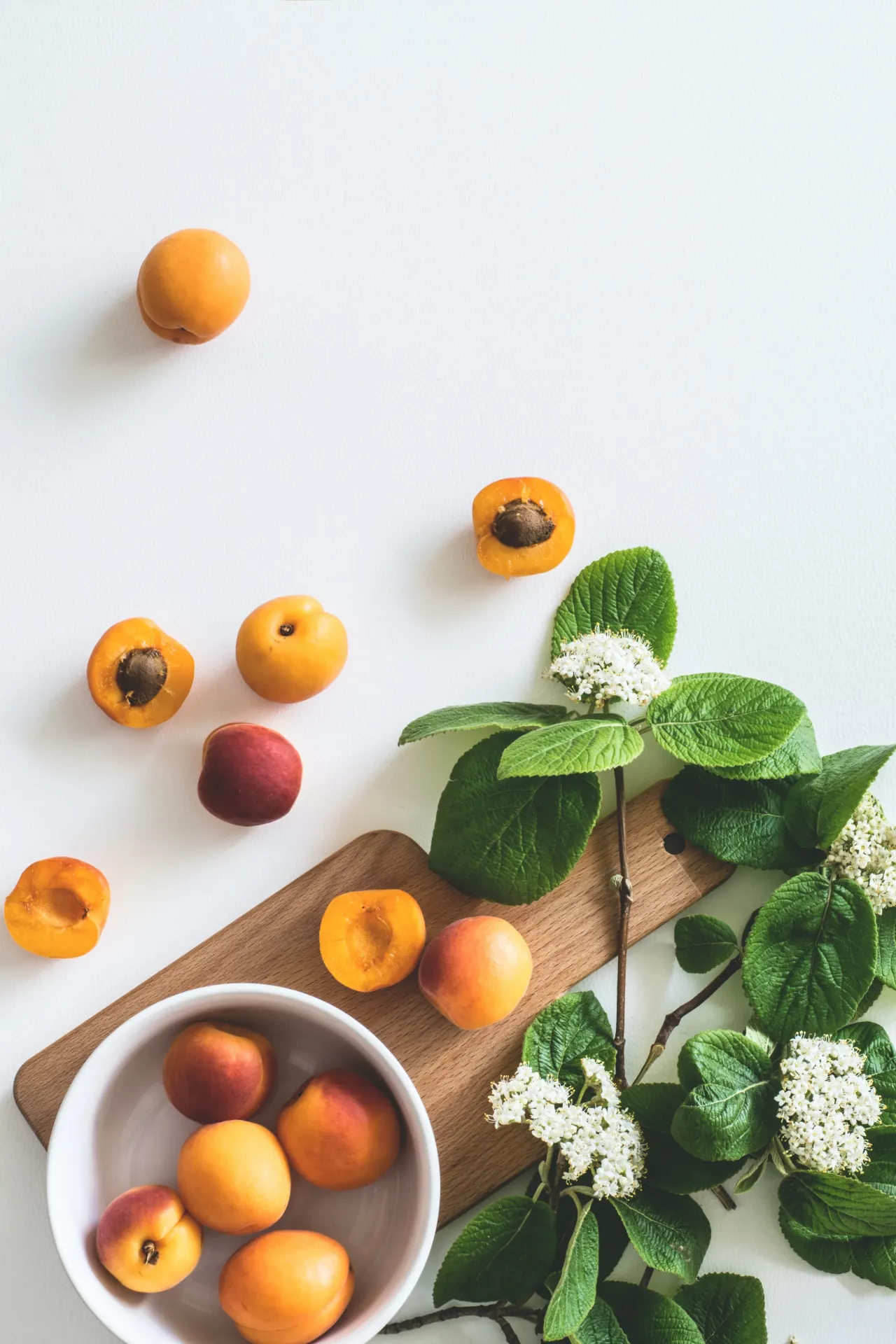 Fresh Apricots with Green Leaves Aesthetic Wallpaper