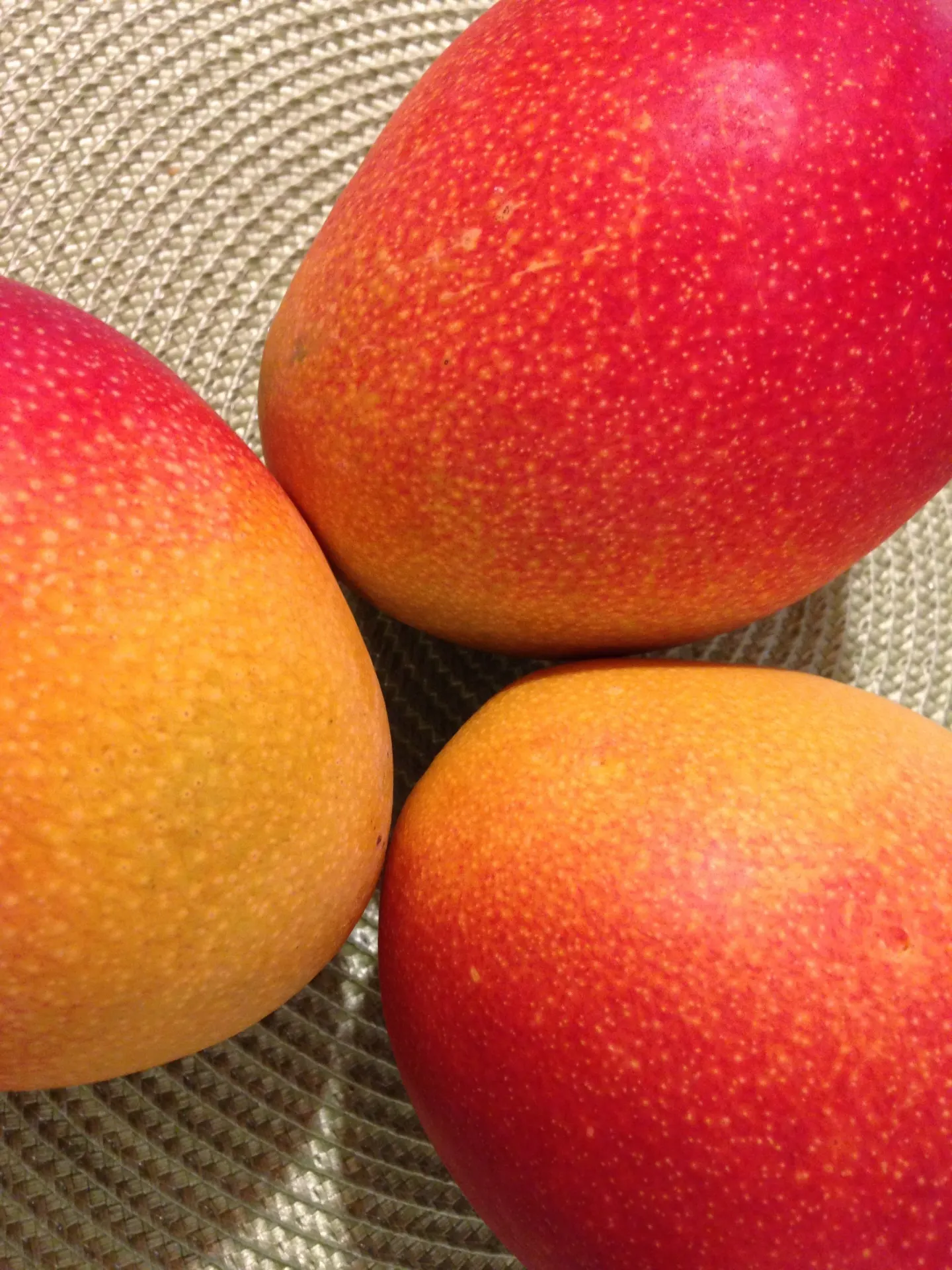 Ripe Red and Golden Mangoes Wallpaper