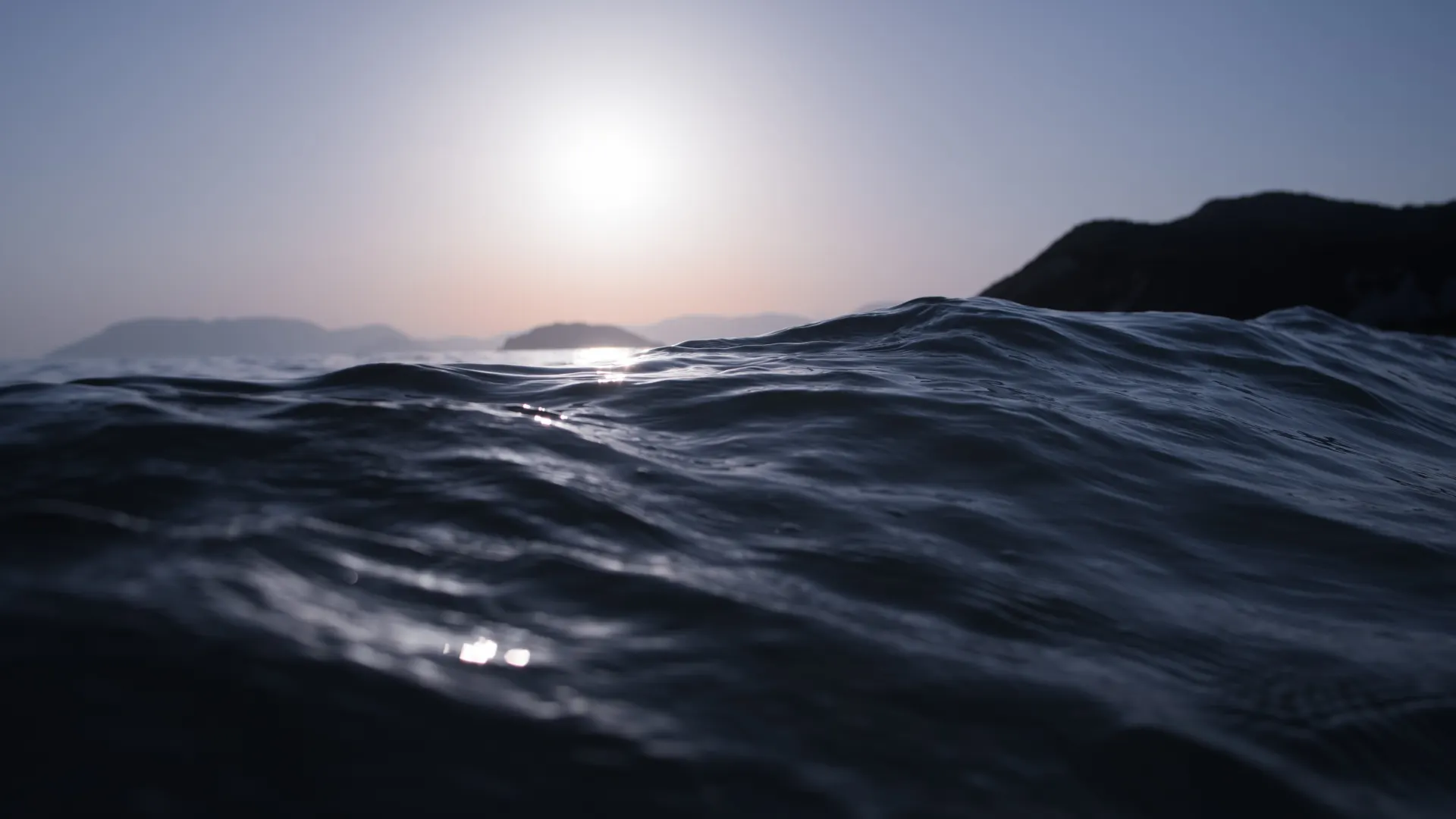 Dark Ocean Waves and Sunset Landscape Wallpaper