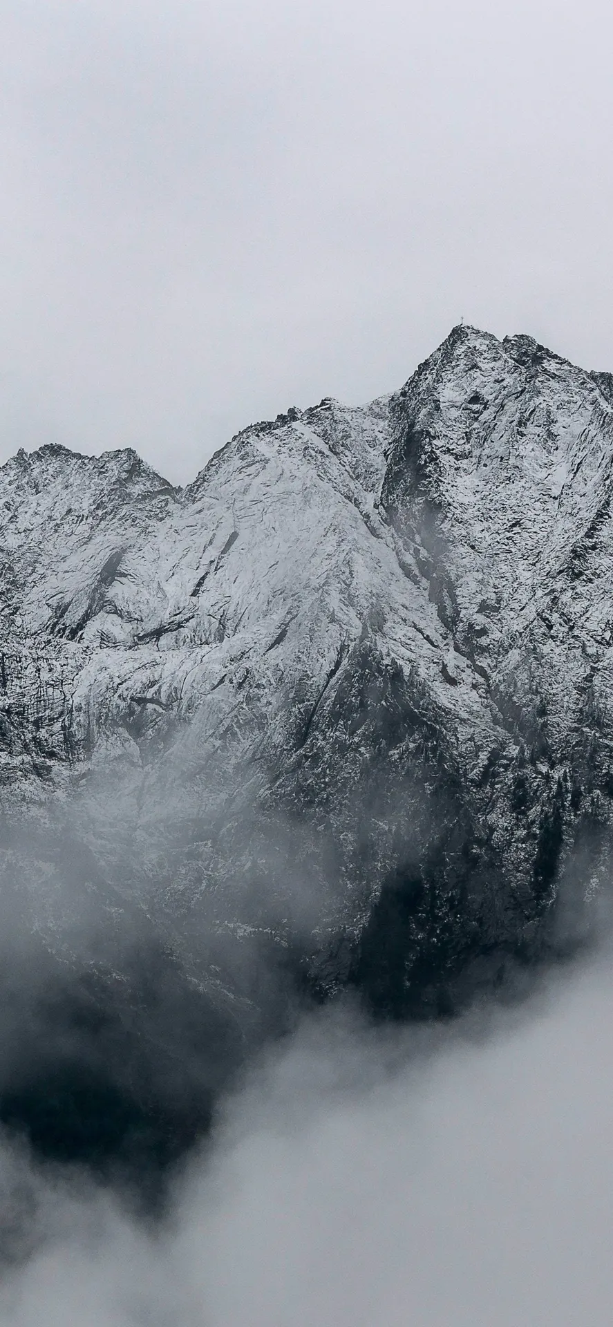 Snow-Covered Mountains and Fog Wallpaper