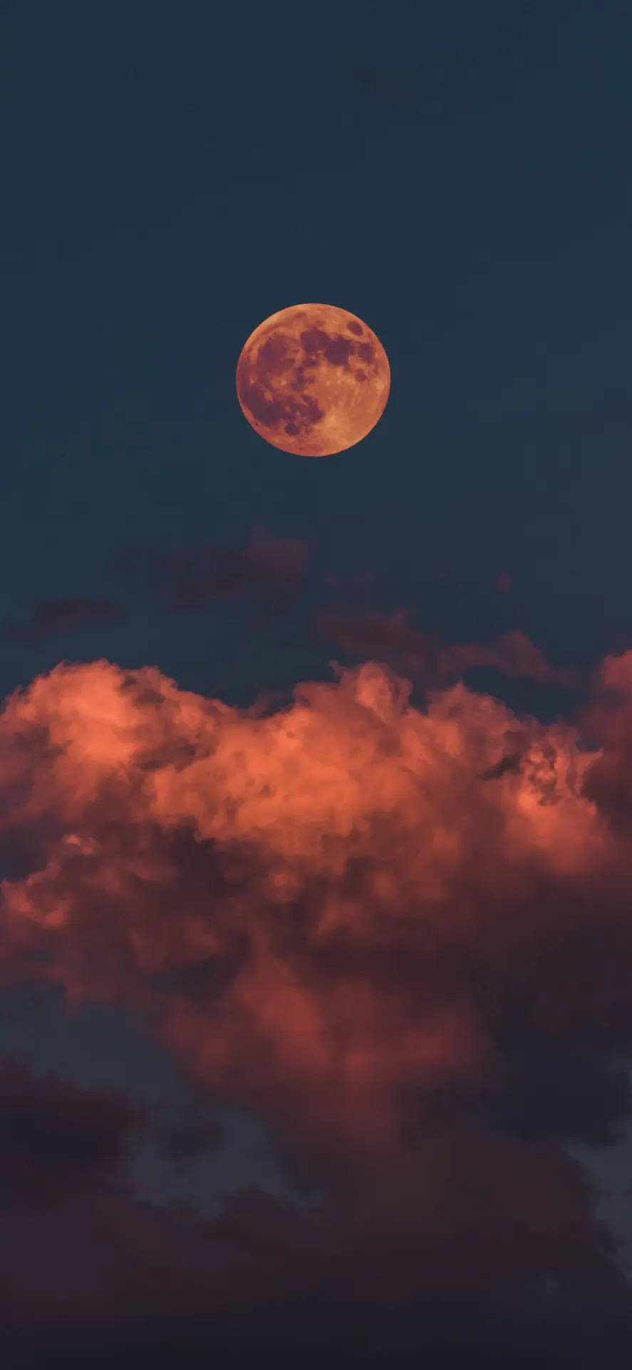 Orange Full Moon and Dramatic Clouds Wallpaper