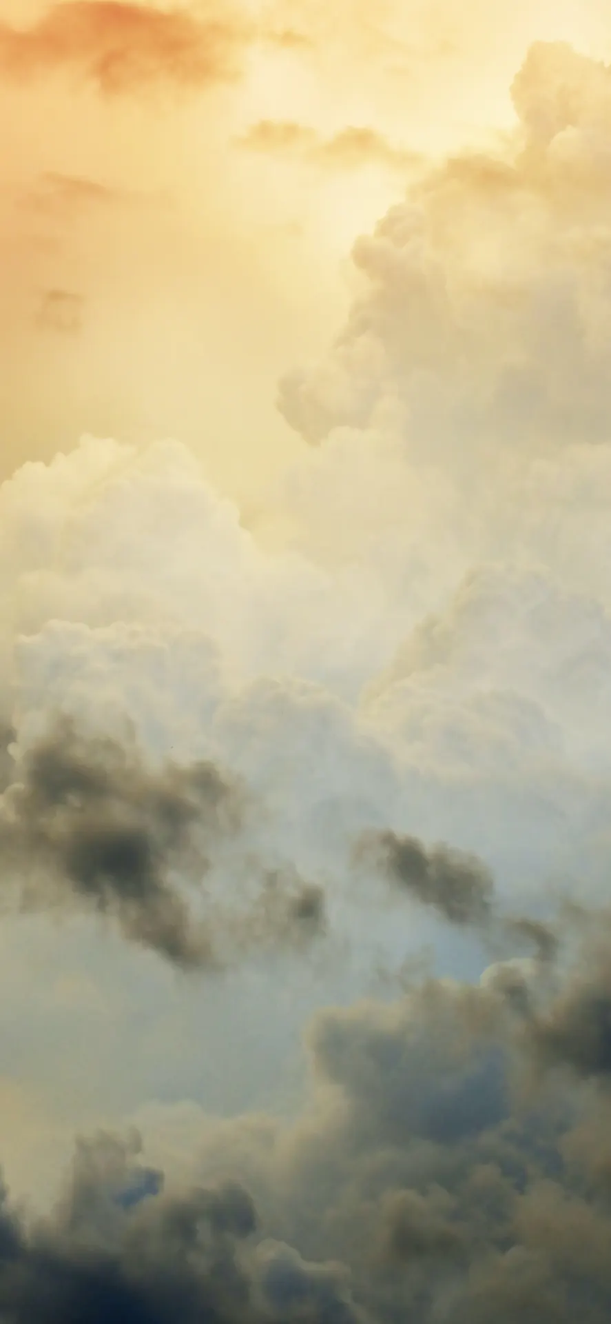Golden Sunlight and Dramatic Clouds Wallpaper